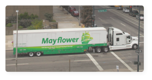 Mayflower Moving truck driving in downtown orlando