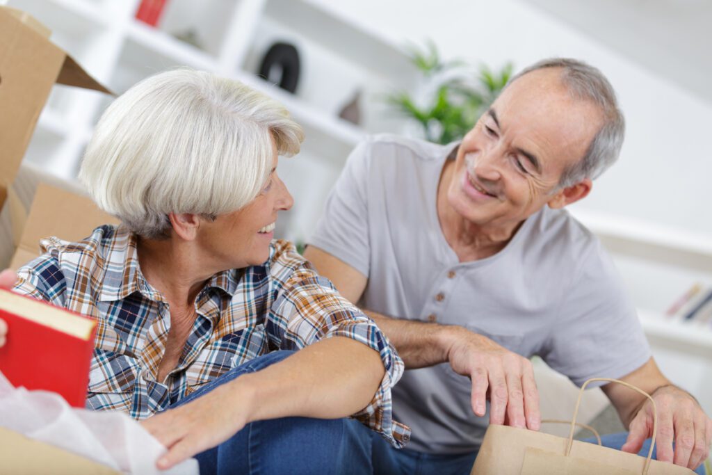 Senior couple packing to downsize in Fort Lauderdale