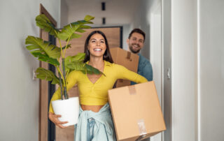 Young couple moving in new home